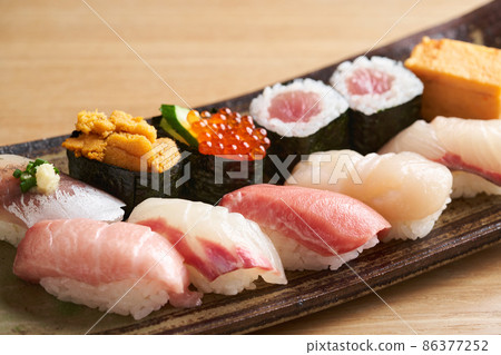 Nigiri sushi served on a plate 86377252