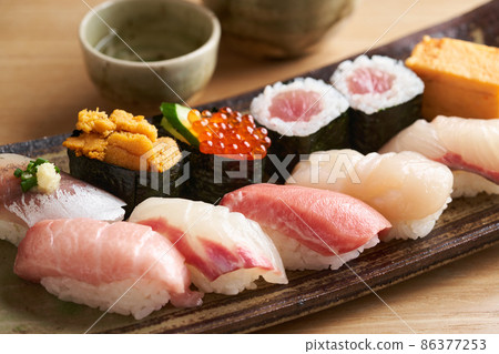 Nigiri sushi served on a plate 86377253