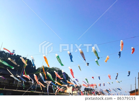 Scenery of carp streamers flying in the sky Scenery of carp streamers flying in the sky 86379155