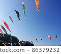 Scenery of carp streamers flying in the sky 86379232