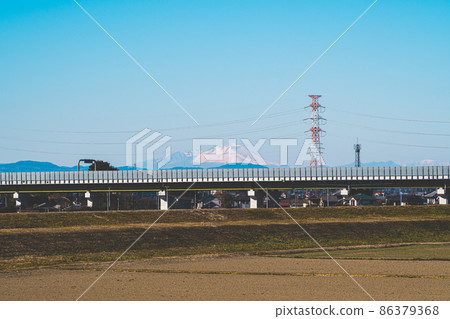 Arakawabashi Expressway in the central area, riverbed in winter, and Mt. Asama in the snow 2022.01 Film style Arakawabashi Expressway in the central area, riverbed in winter, and Mt. Asama in the snow 2022.01 Film style 86379368