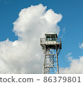 Wildfire lookout tower with big clouds on the background. 86379801