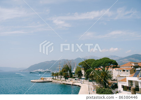 Modern club houses in the resort of Porto. Montenegro Modern club houses in the resort of Porto. Montenegro 86380446