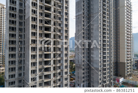 Aerial view of multistory apartment construction site in China Aerial view of multistory apartment construction site in China 86381251