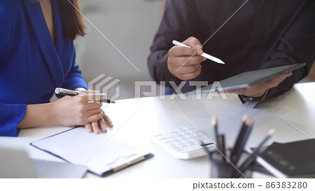 Marketing manager listening assistant sharing his ideas Marketing manager listening assistant sharing his ideas 86383280