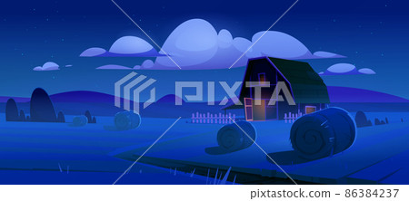Rural landscape with hay bales on field and barn 86384237