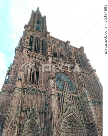 Cathedral of Our Lady or Cathedrale Notre-Dame de Strasbourg, Cathedrale de Strasbourg, Strasbourg Minster in Strasbourg, France. The Roman Catholic cathedral was built in 1176-1439 in Romanesque. 86384692