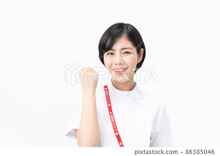 Young nurse in a casey lab coat (white background) Young nurse in a casey lab coat (white background) 86385046