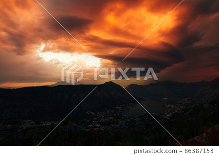 Red-orange sunset sky over the Bay of Kotor. View from Mount Lovcen 86387153