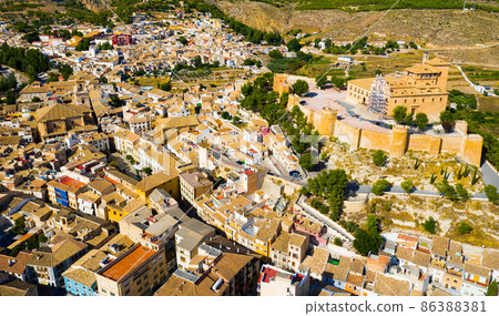 View from drone of of Caravaca de la Cruz overlooking Castle and Basilica, Spain View from drone of of Caravaca de la Cruz overlooking Castle and Basilica, Spain 86388381