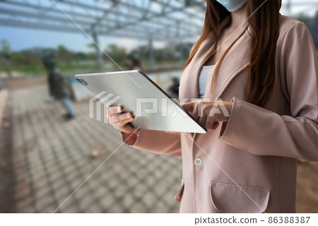 Construction engineers discussion with architects at construction site or building site. 86388387