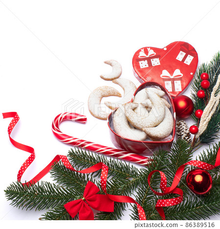 Heart shaped Gift box full of Traditional German or Austrian Vanillekipferl vanilla kipferl cookies Heart shaped Gift box full of Traditional German or Austrian Vanillekipferl vanilla kipferl cookies 86389516