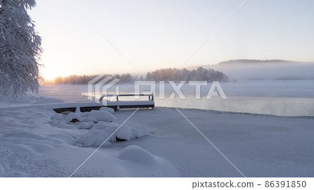 Frozen landscape, River in Arjeplog in winter Frozen landscape, River in Arjeplog in winter 86391850