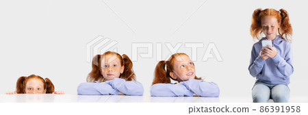 One beautiful little red-headed girl in casual outfit isolated on white studio background. Happy childhood concept. Collage, photo set 86391958