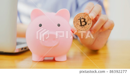 businesswoman holding bitcoin businesswoman holding bitcoin 86392277