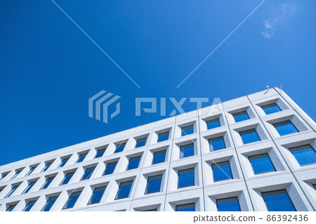 Abstract image of a modern architecture background. Office building and sky Abstract image of a modern architecture background. Office building and sky 86392436