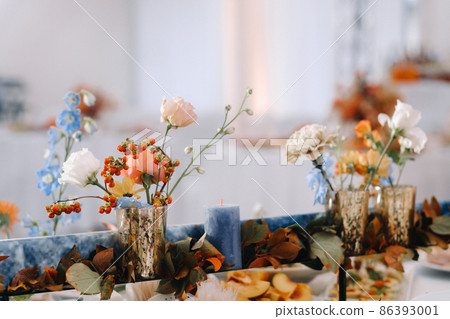 Decorated Table for a wedding reception in a restaurant .Wedding decor Decorated Table for a wedding reception in a restaurant .Wedding decor 86393001