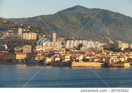 Coastal landscape with Ajaccio on a summer morning, Corsica Coastal landscape with Ajaccio on a summer morning, Corsica 86393682