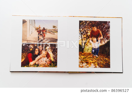 pages of a photobook from a family photo shoot. pages of a photobook from a family photo shoot. 86396527