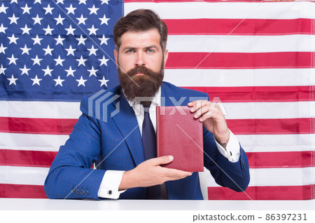 Liberty of printing. Patriotic businessman hold book Liberty of printing. Patriotic businessman hold book 86397231