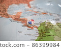 Panama flag drawing pin on the map 86399984