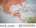 Honduras flag drawing pin on the map 86399986