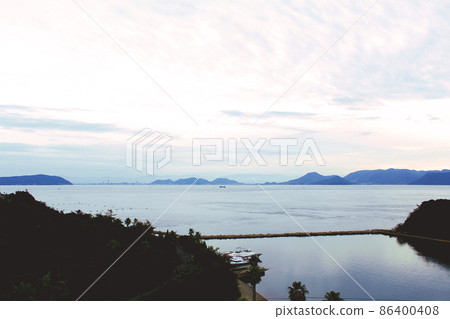 [Kagawa] Scenery from a hill near the Chichu Art Museum in Naoshima in autumn (yellowing removal) 86400408