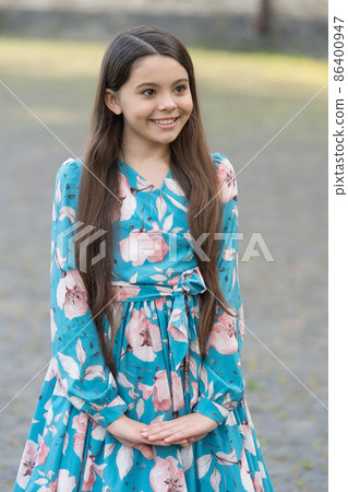 Adorable girl long hair smiling face urban background outdoors, fancy look concept Adorable girl long hair smiling face urban background outdoors, fancy look concept 86400947