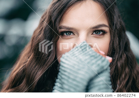 beautiful girl long hair winter close up portrait 86402274