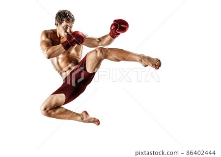 Full size of kickboxer who perform muay thai martial arts on white background. Red sportswear  86402444