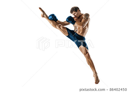 Full size of athlete boxer who exercises thai boxing art on white background. Blue sportswear. Full size of athlete boxer who exercises thai boxing art on white background. Blue sportswear. 86402450