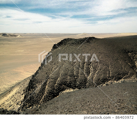 Mountain landscape in Black Desert near Bahariya, Egypt 86403972