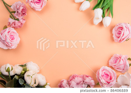 Colorful decorations t with spring flowers on orange background. copy space, top view Colorful decorations t with spring flowers on orange background. copy space, top view 86406889