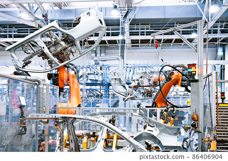 robots in a car factory robots in a car factory 86406904