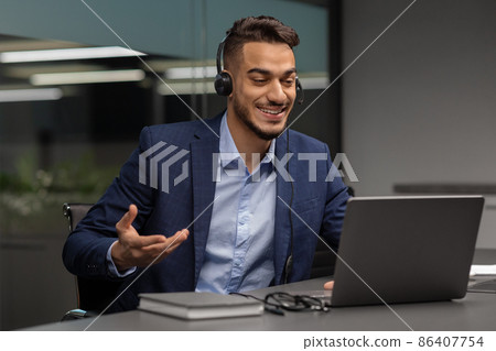 Cheerful arab man entrepreneur having video call with business partners 86407754