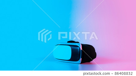 Virtual reality glasses VR. 3d digital headset on futuristic neon tech background. Cyber space game, NFT game activity lifestyle of future. Virtual reality glasses VR. 3d digital headset on futuristic neon tech background. Cyber space game, NFT game activity lifestyle of future. 86408832