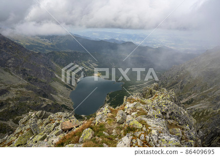 View of the Black Pond Gasienicowy in the High Tatras, Poland. 86409695