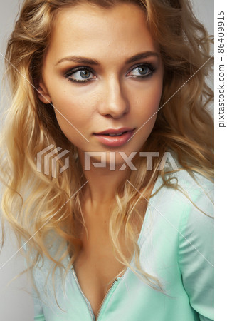 young pretty stylish blond girl posing emotional isolated on white background happy smiling cool smile, lifestyle people concept young pretty stylish blond girl posing emotional isolated on white background happy smiling cool smile, lifestyle people concept 86409915