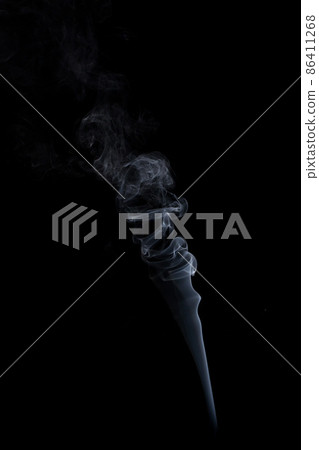 White smoke on a black background. ISOLATED White smoke on a black background. ISOLATED 86411268