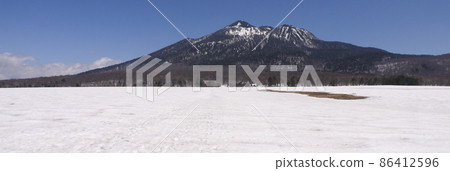 Ozegahara covered with spring Oze and remaining snow Ozegahara covered with spring Oze and remaining snow 86412596