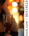 Woman enjoying the night in an atmospheric restaurant 02 86414628