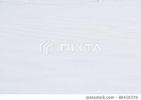 One side of the snow field One side of the snow field 86416339