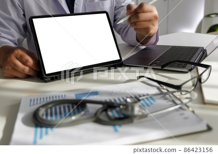 Healthcare and Medical doctor analyzing medical report Medical technology concept.. 86423156