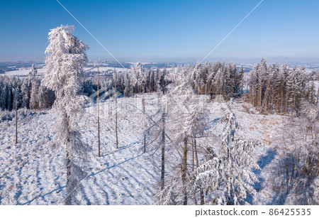 Aerial view of winter highland landscape 86425535