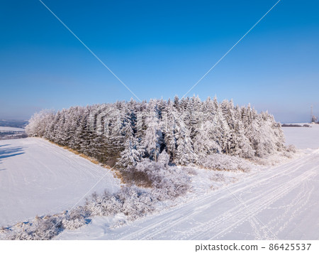 Aerial view of winter highland landscape 86425537