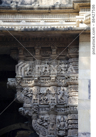 Carved idols on the Vadodara Bhagol also known as the Western gate, located in Dabhoi, Gujarat, India 86427586