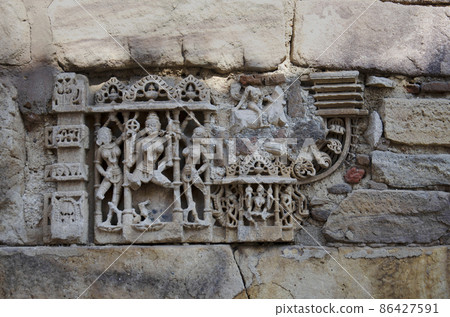 Carved Hira Bhagol, the Eastern gate named after it's architect; Hiradhar, located in Dabhoi, Gujarat, India 86427591