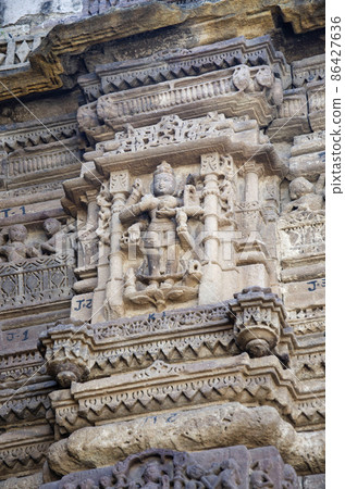 Carved Hira Bhagol, the Eastern gate named after it's architect; Hiradhar, located in Dabhoi, Gujarat, India 86427636
