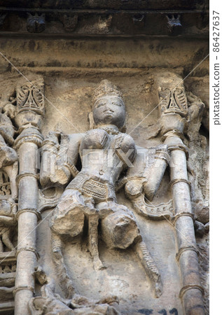 Carved Hira Bhagol, the Eastern gate named after it's architect; Hiradhar, located in Dabhoi, Gujarat, India 86427637