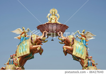 Gajalaxmi Statue at entrance gate of Nilkanthdham, Swaminarayan temple Poicha, Gujarat, India 86427640